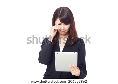 weeping businesswoman with tablet