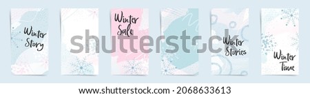 Winter sale stories banners fashion template set. Winter snow design for new stories and promo posts. Winter design with snowflakes, abstract shapes and wavy lines in white, blue, and pink colors set. Royalty-Free Stock Photo #2068633613