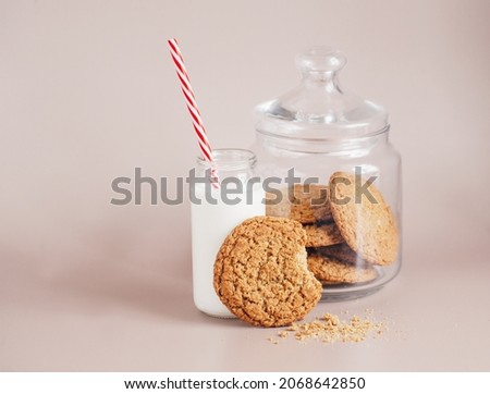 Fresh oatmeal cookies in a glass jar