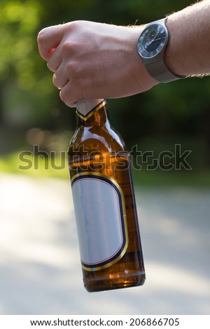 beer bottle in hand