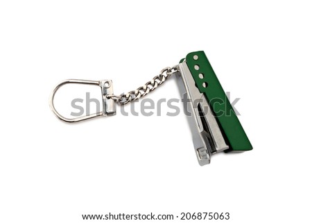 green keychain stapler isolated on white background