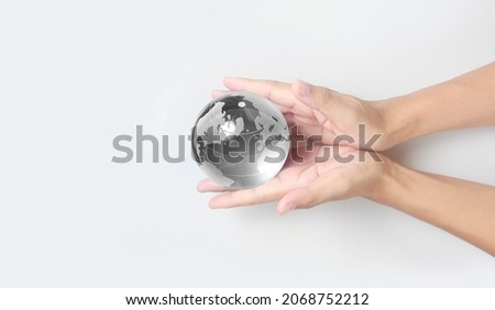 Globe in hand,Energy saving concept, Elements of this image furnished by NASA