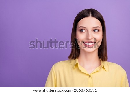 Photo of young lovely girl wondered look empty space plan thoughtful isolated over violet color background
