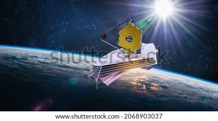 James Webb telescope in outer space on orbit of Earth. Planet surface and satellite. Elemets of thisd iamge furnished by NASA Royalty-Free Stock Photo #2068903037