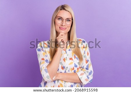 Photo of charming thoughtful young woman wear print shirt spectacles smiling arm chin isolated violet color background Royalty-Free Stock Photo #2068915598