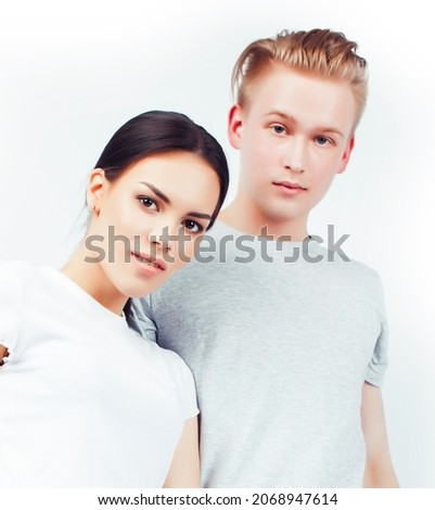 modern hipster guys together couple diverse nations, asian girl and caucasian blond boy isolated on white background, lifestyle people concept