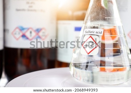 sulfuric acid in glass, chemical in the laboratory and industry Royalty-Free Stock Photo #2068949393
