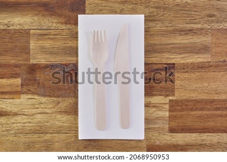 A studio photo of wooden cutlery