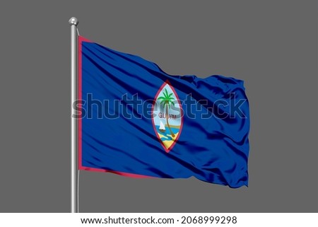 Guam flying flag on a black background for designer