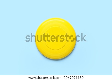 Frisbee disk on color background