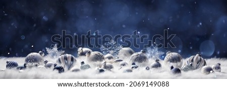 Christmas Balls In Night On White - Silver Ornament In Abstract Defocused Background