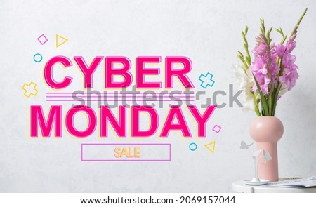 Vase with beautiful gladiolus flowers and text CYBER MONDAY SALE on light background