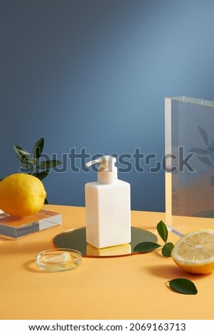 Template cosmetic jar lemon and transparent wall in a mirror dish , green leaf petri dish for cosmetic advertising , front view 
