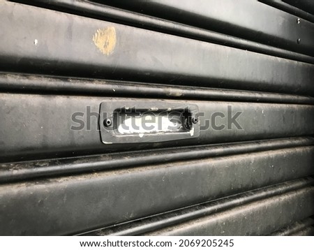 Black rolling door with aluminum material