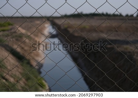 closeup photo of mesh wire fence 