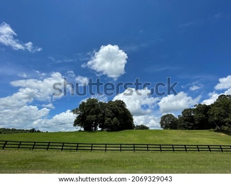Beautiful farmland pasture brown wooden fence
