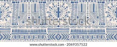 Ikat geometric folklore ornament. Tribal ethnic vector texture. Seamless striped pattern in Aztec style. Figure tribal embroidery. Indian, Scandinavian, Gypsy, Mexican, folk pattern. Royalty-Free Stock Photo #2069357522