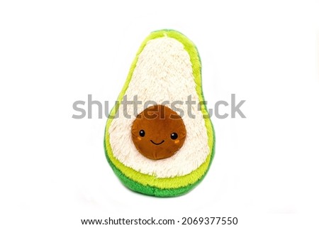 Soft toy avocado isolate on a white background. creative banner flyer with copy space, place for text.