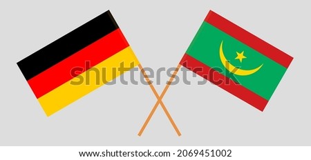Crossed flags of Germany and Mauritania. Official colors. Correct proportion