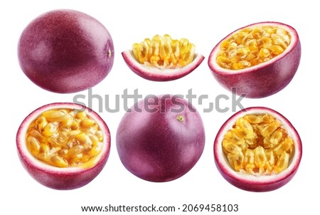 Set of six ripe passion fruit, whole and pieces, isolated on a white background. A collection of cut and whole passion fruit with shiny tasty pulp. Royalty-Free Stock Photo #2069458103