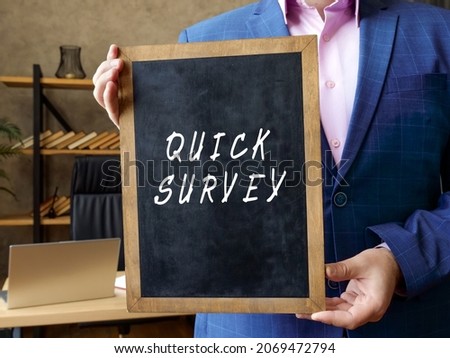Financial concept meaning QUICK SURVEY with sign on the board 
