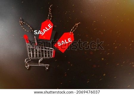 Shop trolley at supermarket. Sale, discount, shopaholism concept. Minimalism style. Creative design. Copy space. Banner.