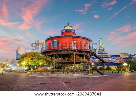 Seven Foot Knoll Lighthouse in Inner Harbor Baltimore, Maryland USA at sunset Royalty-Free Stock Photo #2069487041