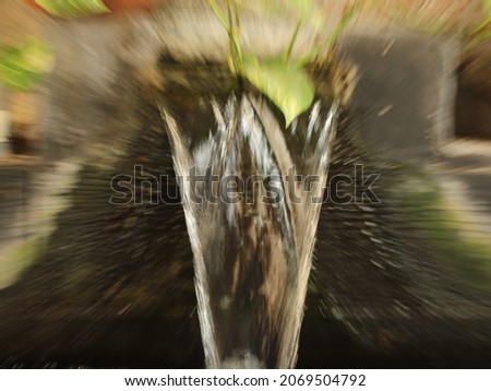 zoom blur of waterfall. water background blurred