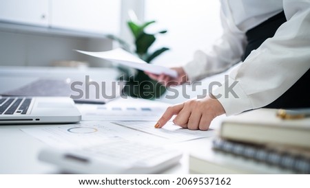 Auditor or internal revenue service staff, Business women checking annual financial statements of company. Audit Concept. Royalty-Free Stock Photo #2069537162