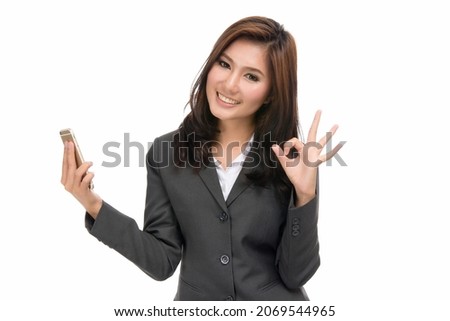 Surprised happy young business Asian woman holding smartphone ,portrait of beautiful thai woman,isolated on white background