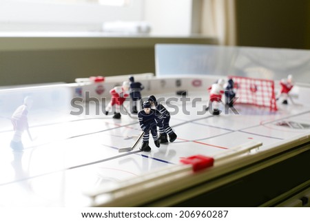 toy hockey table in the bright room