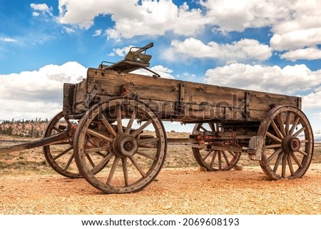 Old fashioned horse-drawn wagon, pioneer style. Vintage Americana buggy as used in the wild west, California, USA Royalty-Free Stock Photo #2069608193