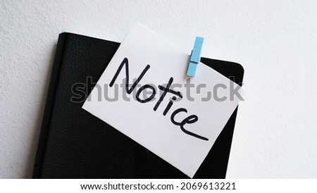 Notice message concept written post it on notebook. Royalty-Free Stock Photo #2069613221