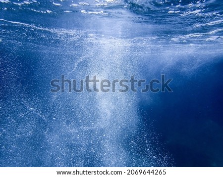 Underwater sea bubbles, bubble wave under the ocean, blue sea water bubble, real picture suitable for background