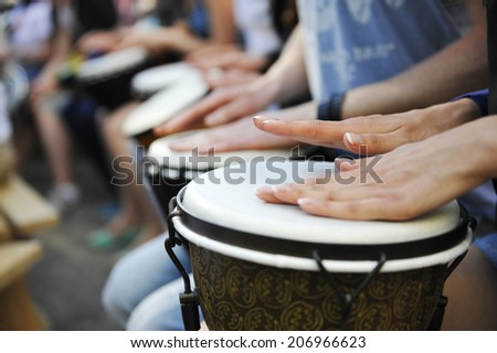 group of people with African drums Royalty-Free Stock Photo #206966623