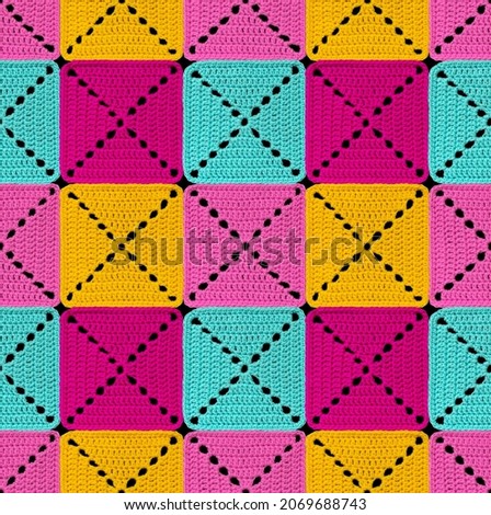 Seamless knitted pattern in patchwork style. The geometric elements are crocheted from multi-colored acrylic yarn. Bright colors. Royalty-Free Stock Photo #2069688743
