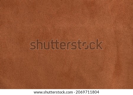 Brown suede. Brown background. Cognac color background Royalty-Free Stock Photo #2069711804