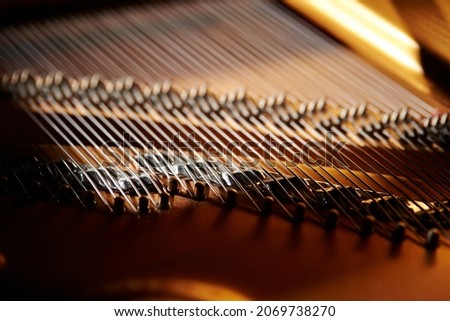 Close-up of detail inside a grand piano 