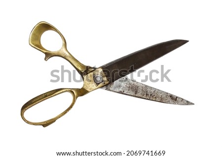 wide open old tailor shears isolated on white background.