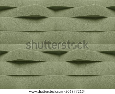 stacks of gray foam sheet material of different thicknesses are arranged crosswise. Beautiful texture with perspective style. foam sponge creativity