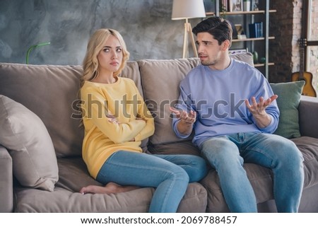 Photo of young couple unhappy negative moody conflict quarrel argument offended speak sit sofa indoors Royalty-Free Stock Photo #2069788457