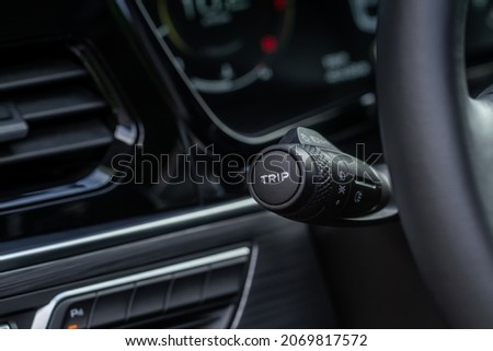Light switch control. Close up of car light switch and control. Modern car interior detail.