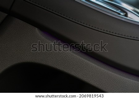 Modern car interior close up view with metallic and plastic details. Interior detail.
