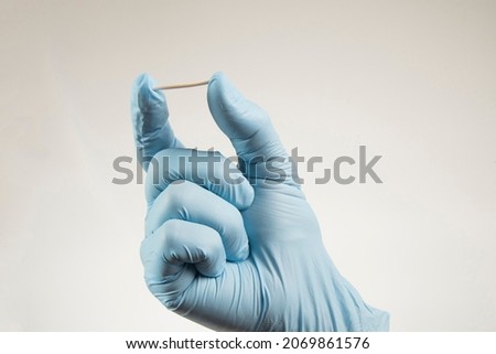 Hormonal implant or beauty chip is a subcutaneous application. Royalty-Free Stock Photo #2069861576