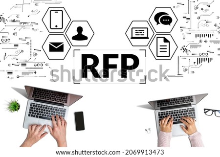 Business acronym RFP or Request For Proposals. Persons work on computers. Royalty-Free Stock Photo #2069913473
