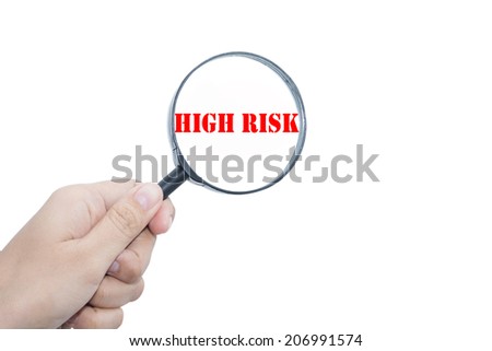 Hand Showing  HIGH RISK   Magnifying Glass 