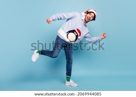 Full length photo of happy cheerful positive man good mood runner holiday sale isolated on blue color background