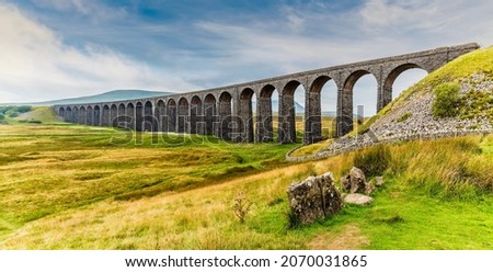 A panorama view of the Ribblehead Viaduct, Yorkshire, UK in summertime Royalty-Free Stock Photo #2070031865