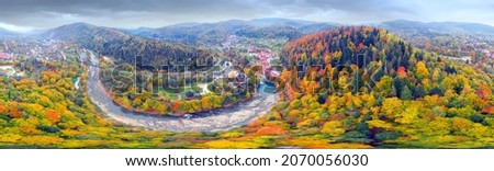Aerial photo drone copter photo from a bird's eye view of the famous Probiy waterfall in the resort town of Yaremche, Ukraine, among a beautiful autumn forest in the Carpathians. Panorama 360 degrees 