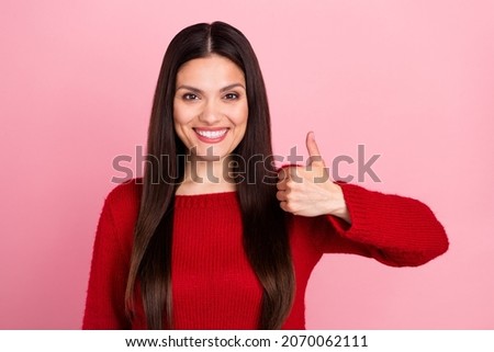 Photo of cool brunette lady show thumb up wear red sweater isolated on pink color background